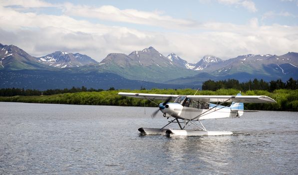 Single Prop Airplane Pontoon PLane Water Landing Alaska Last Frontier