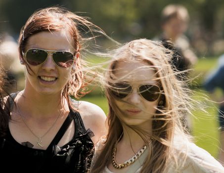 Two college girls with sunglasses