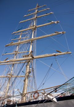Ship mast on blue sky
