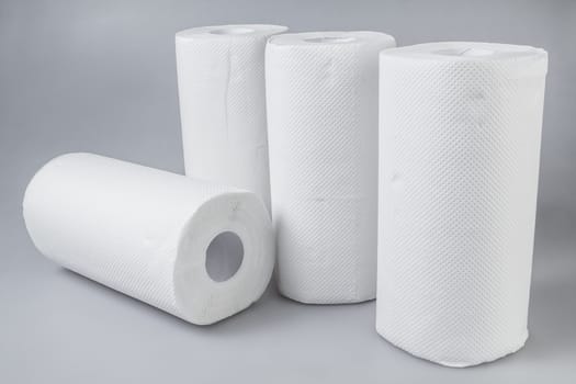 Stack of white tissue paper rolls.