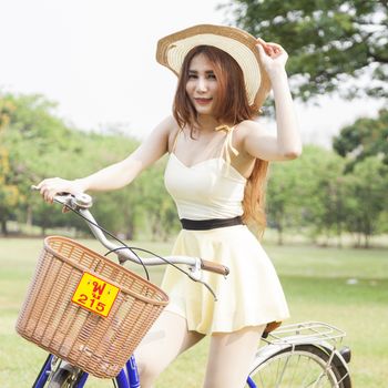Woman are bicycling