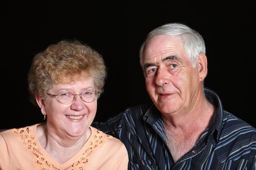 Portrait of a senior couple in their mid to late sixties.