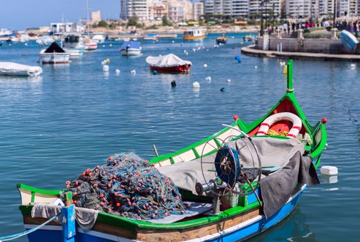 fishermen boat in Spinola bay at Malta close up