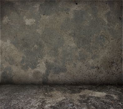 Grungy concrete wall and floor.