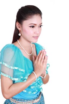 woman wearing typical thai dress pay respect