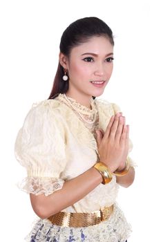 woman wearing typical thai dress pay respect