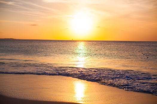 Stunning beautiful sunset on an exotic caribbean beach