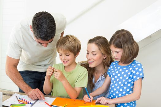 Happy family coloring at home