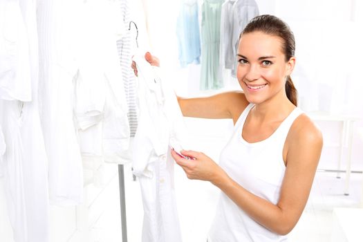 Woman shopping in a clothing boutique,