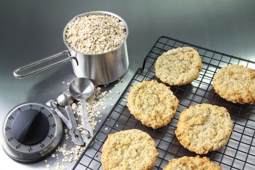 Freshly baked oatmeal cookies on cooling rack