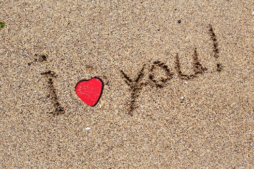 I love you note on the beach
