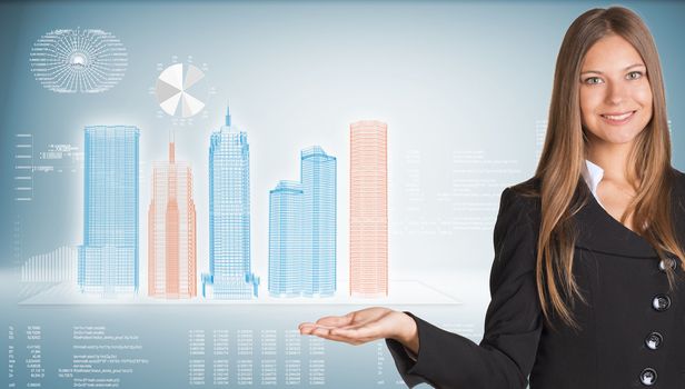 Businesswoman with high-tech skyscrapers and graphs