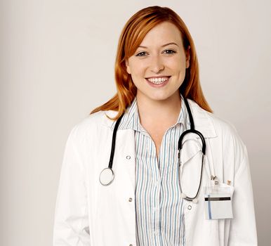 Smiling friendly female doctor
