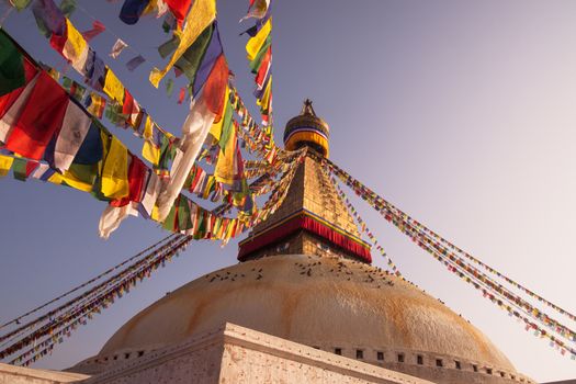 Prayer flags and Boudhanath stupa in Kathmandu
