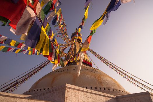 Colorful Prayer flags and Boudhanath stupa in Kathmandu