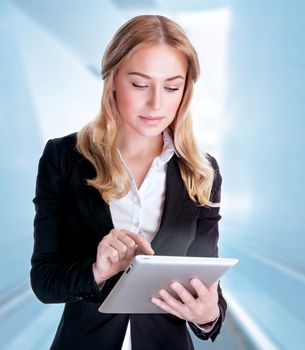 Business woman using touch pad