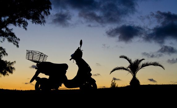 Motorbike with basket in Silouette