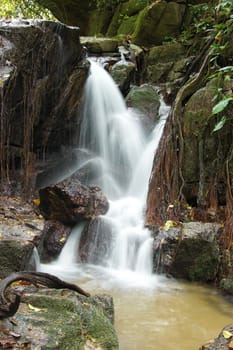 The small waterfall and rocks in forest, thailand