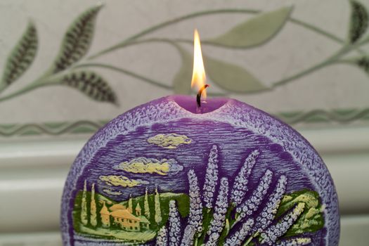 Candle with lavender flowers. Aromatherapy concept 