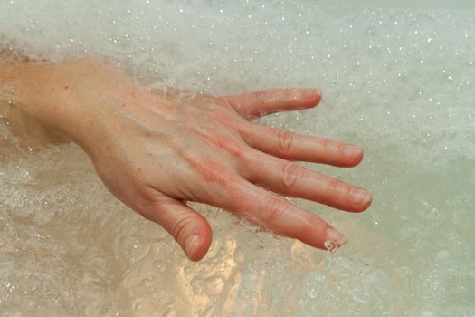 the water massage of tired hands