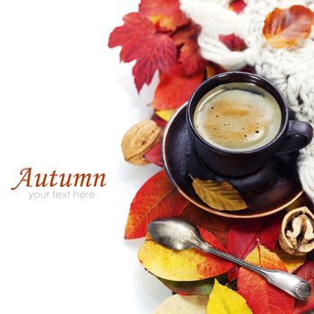 cozy cup of coffee and autumn leaves