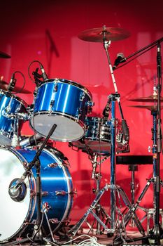 Drumkit in front of Blue Background