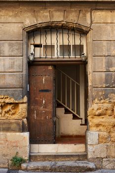 Old door of an ancient building in Aix en Provence town, Soth France