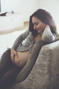 Home portrait of pregnant woman