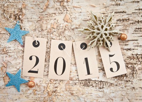 2015 on rustic wooden background