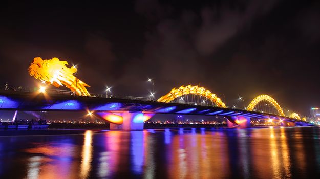 Dragon bridge by night in Danang city