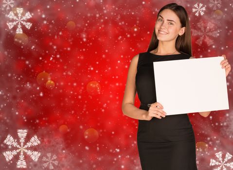 Businesswoman holding empty paper. Christmas backgrond
