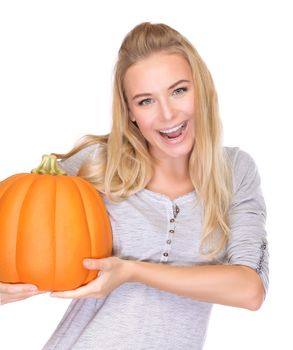 Cheerful female with festive pumpkin