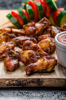 Sticky chicken with red hot dip