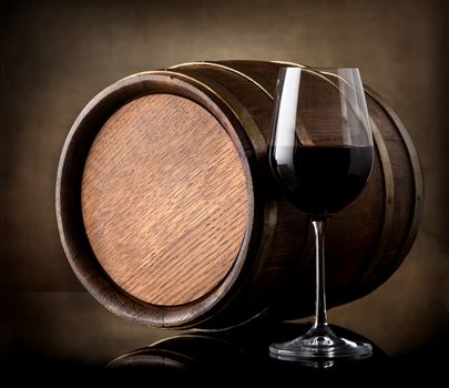 Red wine and a wooden barrel