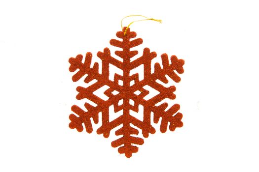 Red snowflake on white background