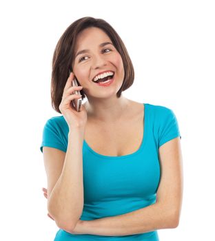 Pretty girl laughing on the phone, isolated on white