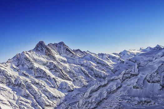 Jungfrau mountain ridge helicopter view in winter
