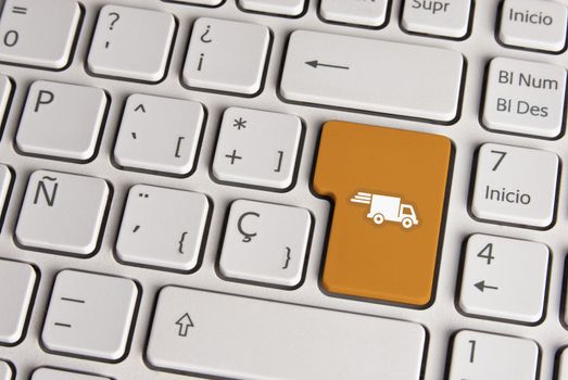 Delivery concept, shipping truck keyboard key.