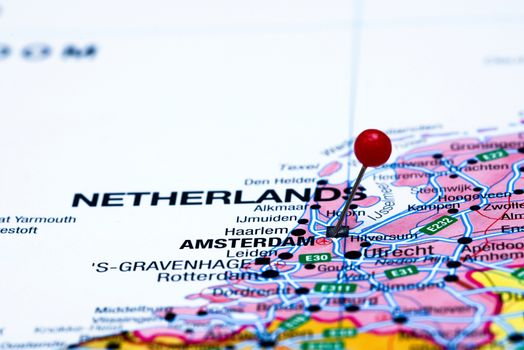 Amsterdam pinned on a map of europe