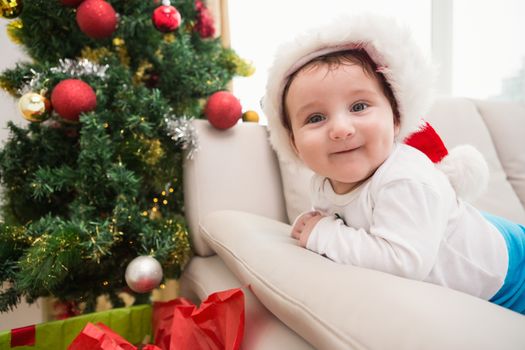 Cute baby boy on couch at christmas