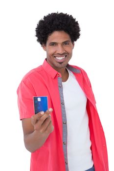 Happy man showing credit card
