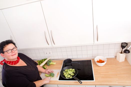 Woman cutting vegetables 