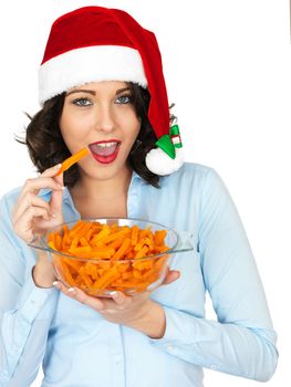 Attractive Young Woman in Christmas Santa Hat Holding a Bowl of Carrots