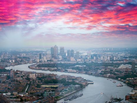 Canary Wharf aerial skyline and river Thames in London. Beautifu