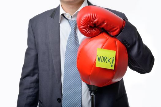 businessman with boxing glove ready to fight with work, business