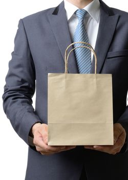 businessman hold paper bag with both hand,business concept