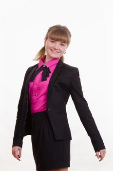 Portrait of young slim girl in a suit