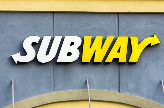 SANTA CLARITA, CA/USA - DECEMBER 18, 2014:  Subway Restauraut exterior. Subway is an American fast food restaurant franchise that sells submarine sandwiches and salads.