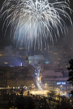 Brasov, Romania - January 1, 2012: New Year fireworks in Brasov old city center, Romania