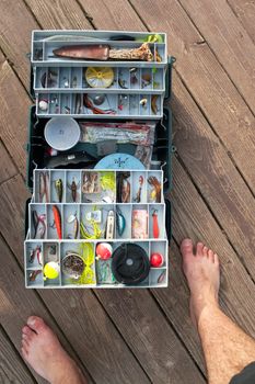 Fishing Tackle Box On a Dock